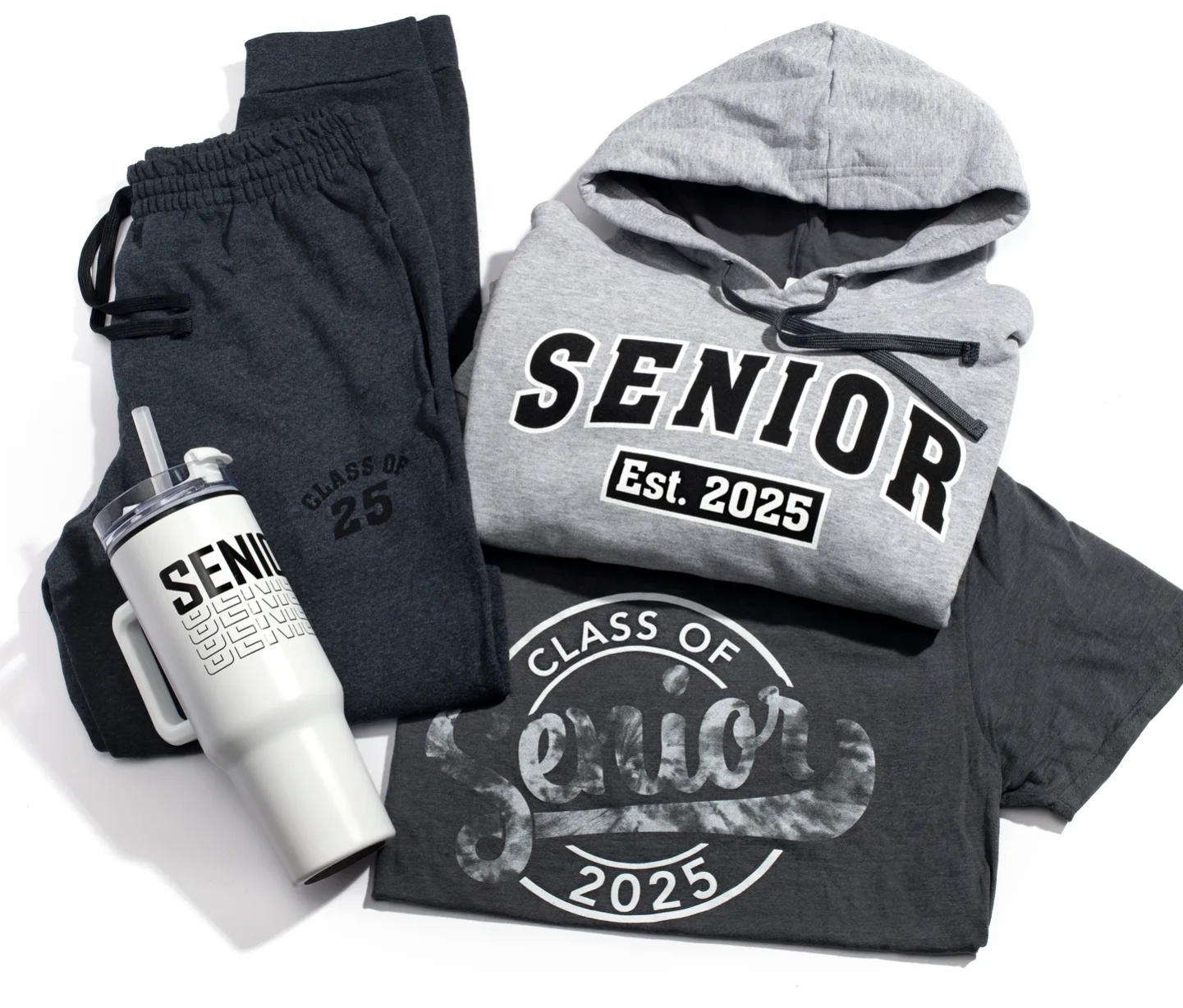 A group of items that include a hoodie, sweatshirt and pants.