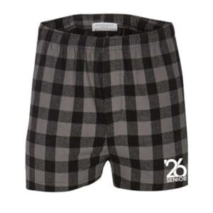 Black and gray checkered shorts with a white logo on the bottom.