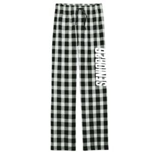 Black and white checkered pants with a white graphic patch on one leg.