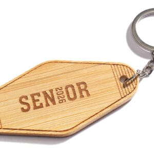Wooden keychain with 'SENIOR' engraved, attached to a metal ring.